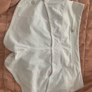 White Speed Up 2.5” inch low-rise Lululemon shorts in a size 2, used.